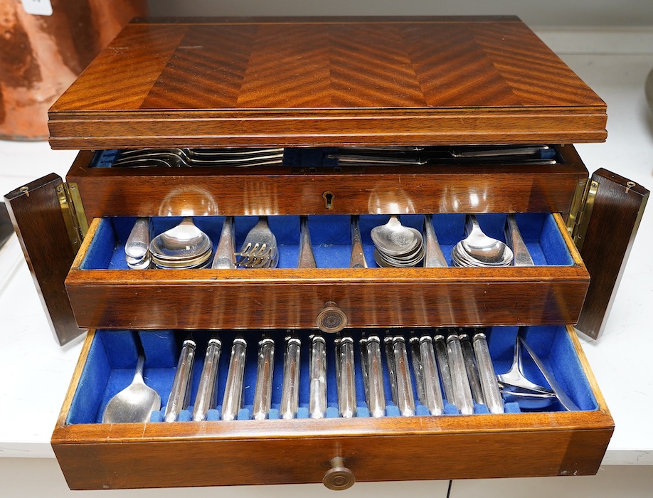 A 1930's mahogany cased canteen of Old English pattern flatware, canteen 45.5cm wide. Condition - case fair, flatware good
